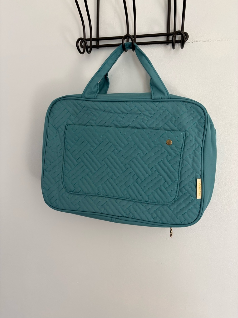 Teal Bagsmart quilted hanging travel toiletry bag